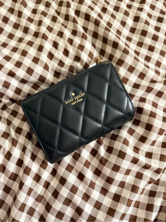 kate spade Handbags - kate spade black quilted leather zip-around wallet with gold logo